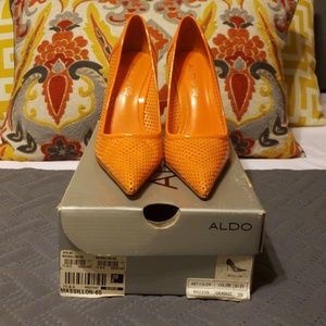 Orange laser cut Aldo pumps